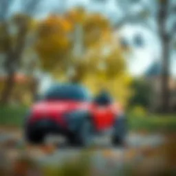 Vibrant red electric car for children in a park setting